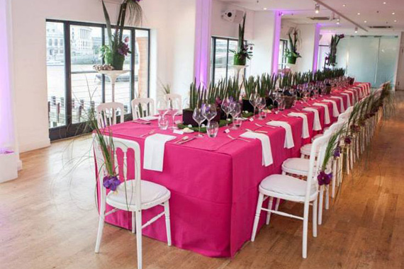 OXO2 Venue Hire SE1, boardroom style lunch set up with stunning table centre pieces