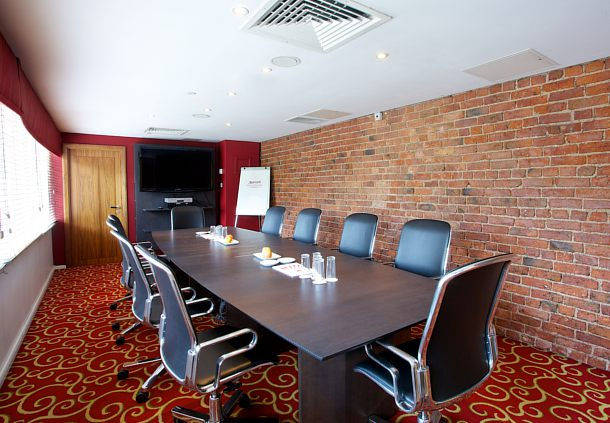 Irwell Room set up in boardroom style with natural daylight for a meeting Manchester Marriott Victoria Albert Hotel Venue Hire M3