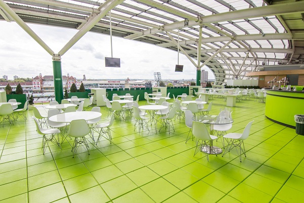 Kia Oval Summer Party Venue SE11 tables and chairs outside of guests to sit