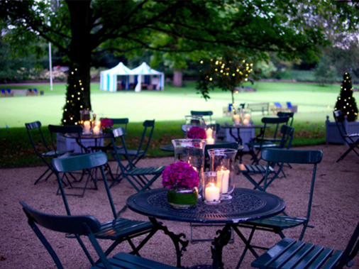 Hurlingham Club, Summer Party Venue SW6, seated outside area, fairy lights, table centre pieces