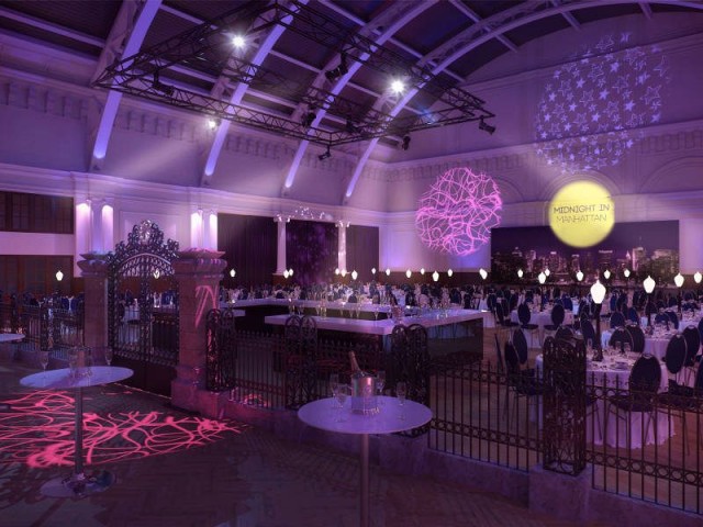 Royal Horticultural Society Christmas Party SW1- view of venue with round tables set up for dinner with iron gate decor