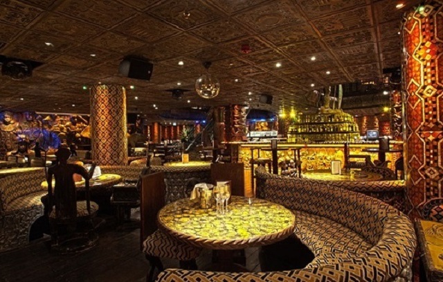 Shaka Zulu Christmas Party NW1, spacious view, large dining area, cultural decor.