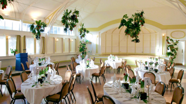 Terrace Suite set for a dinner with floral decor hanging from the ceiling and from the tables with lots of natural daylight Birmingham Botanical Gardens Venue Hire B15