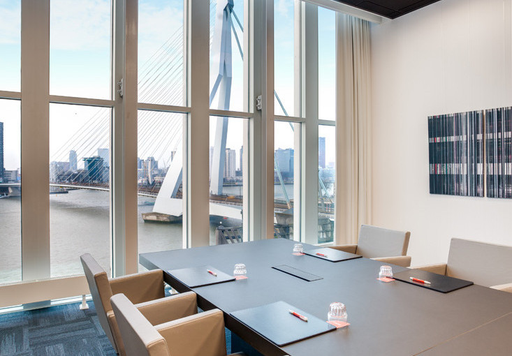 Conference Centre set out in boardroom style with floor to ceiling windows Nhow Rotterdam Venue Hire Holland