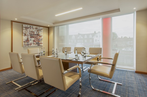 Hyatt Place Heathrow Venue Hire UB4. boardroom meeting with daylight shining through